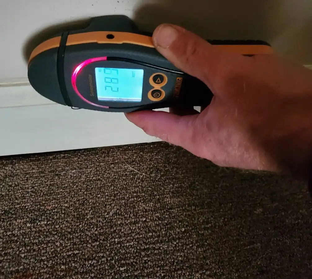 Moisture detection at baseboard during Storm Damage Restoration in Markham